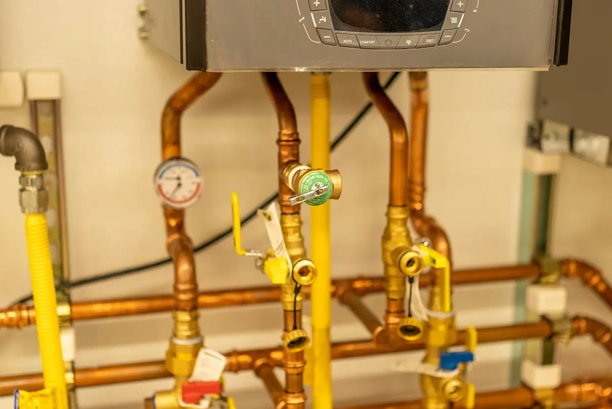 Licensed technician providing Backflow Prevention for a homeowner in Boone